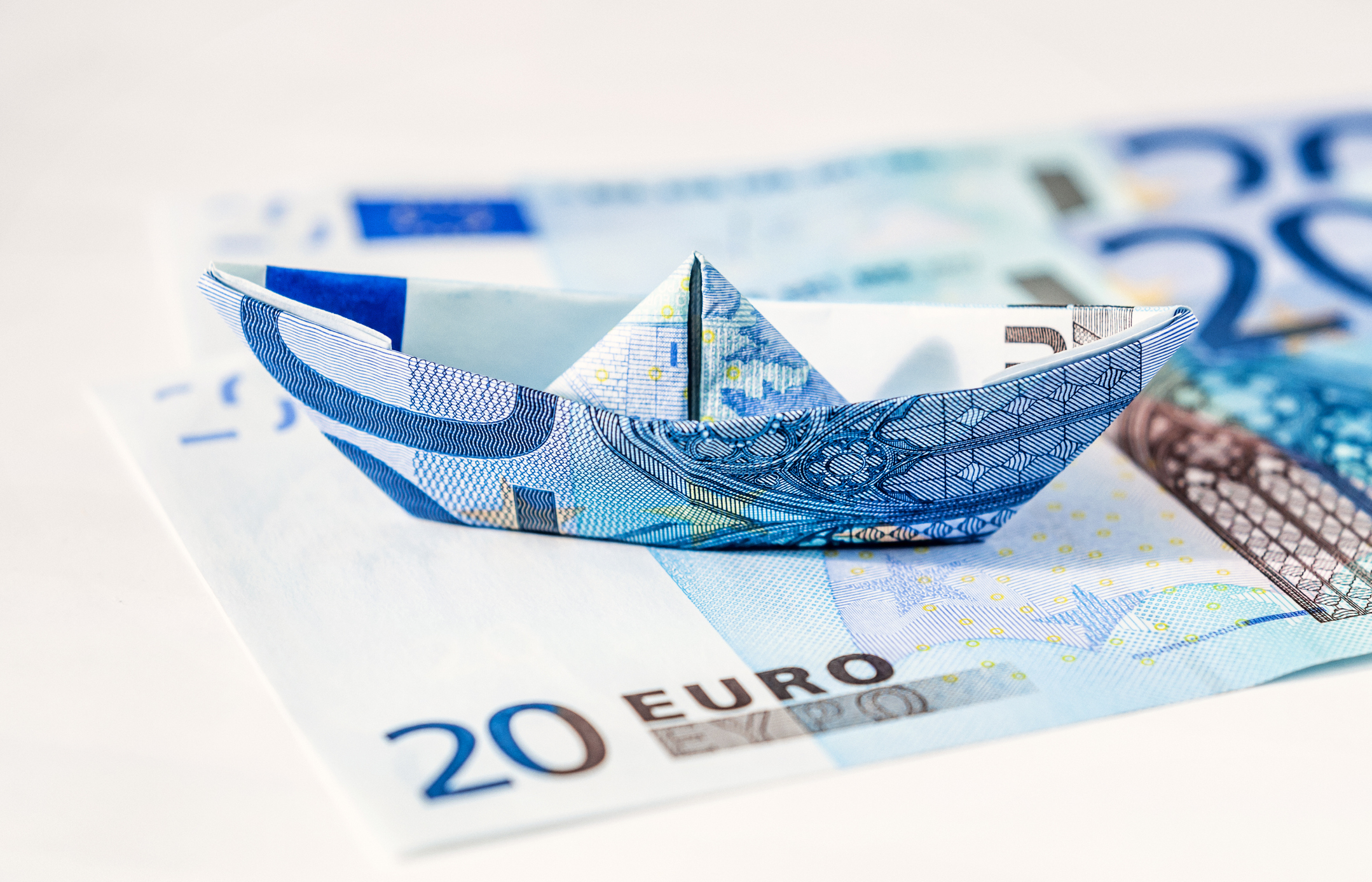 Little ship folded from a Euro banknote Little ship folded from a Euro banknote