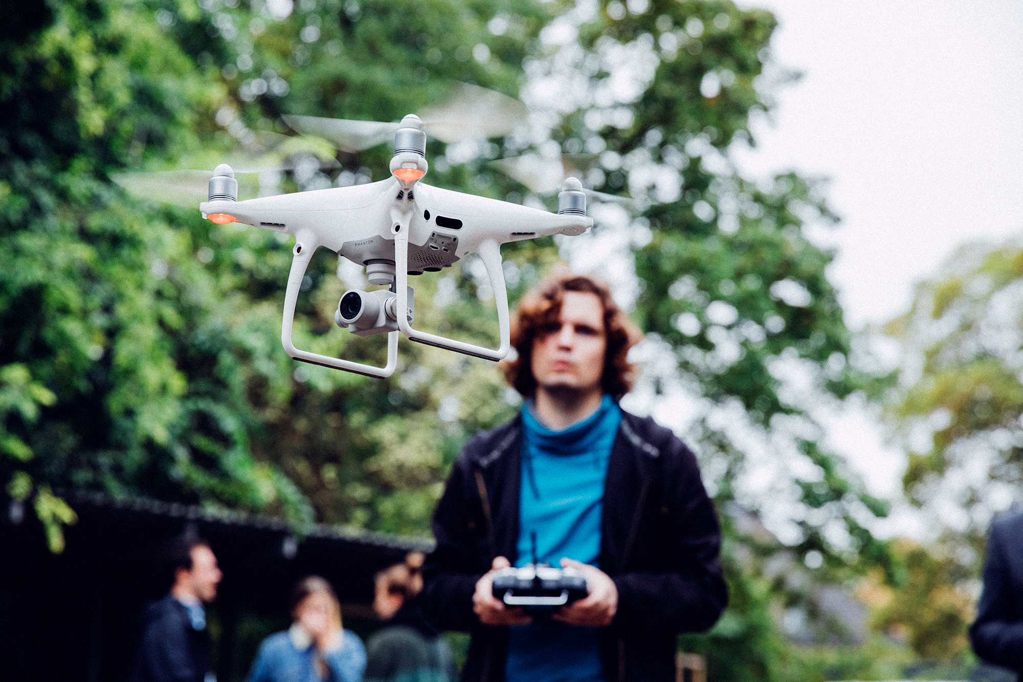 student flying a quadrocopter