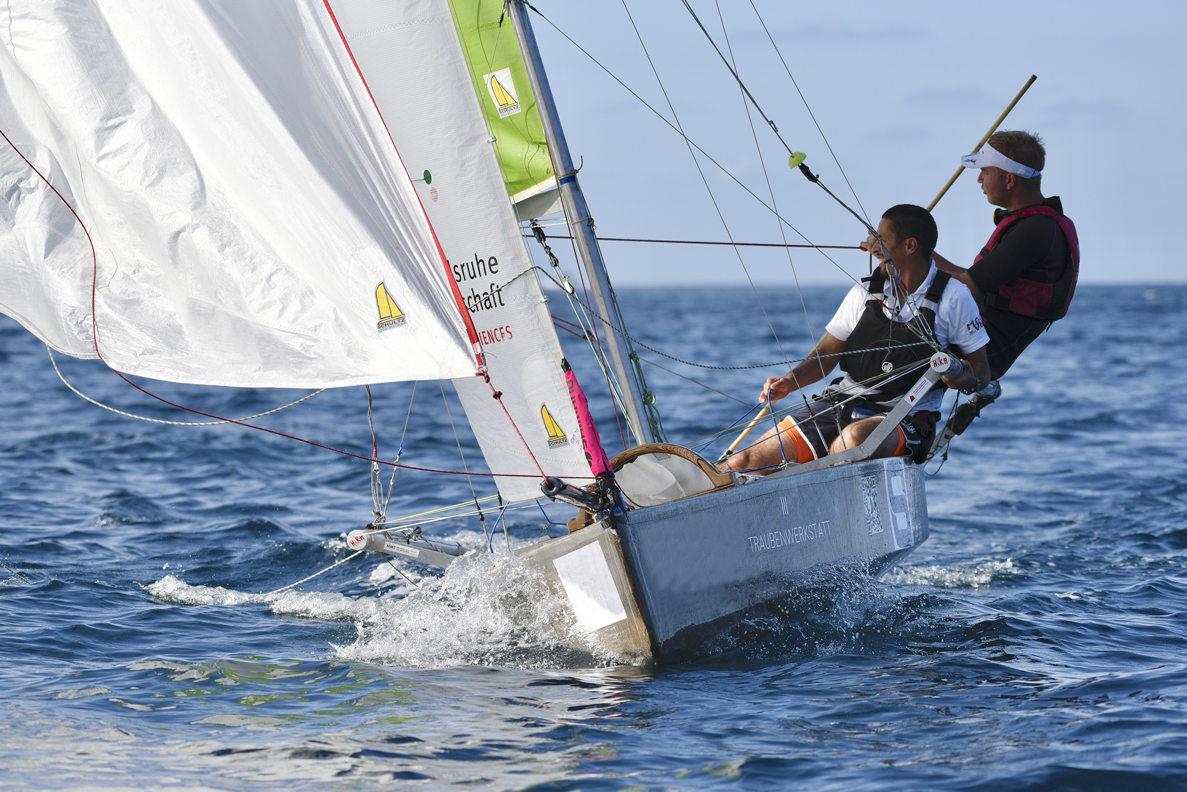 HKA Eco Sail team sailing their own boat at a competition HKA Eco Sail team sailing their own boat at a competition