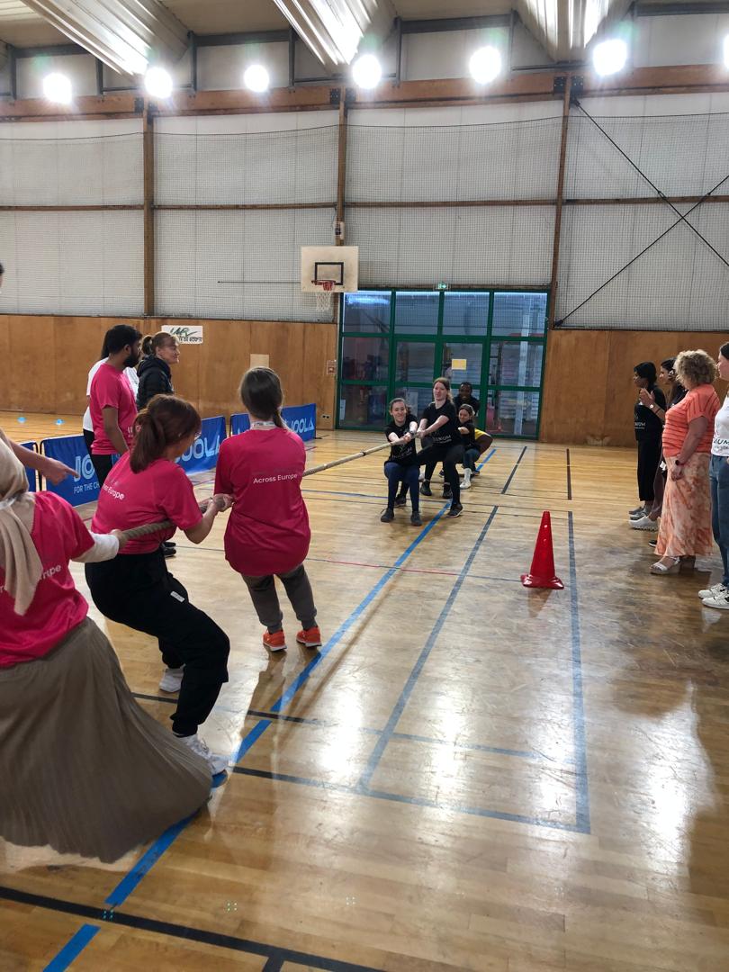 young people playing tug-o-war