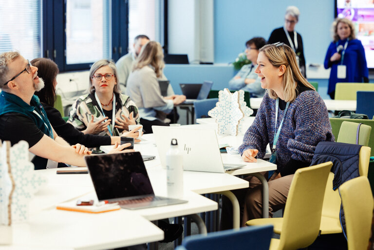 Lecturers discussing innovative teaching methods during the staff academy at XAMK, Finland