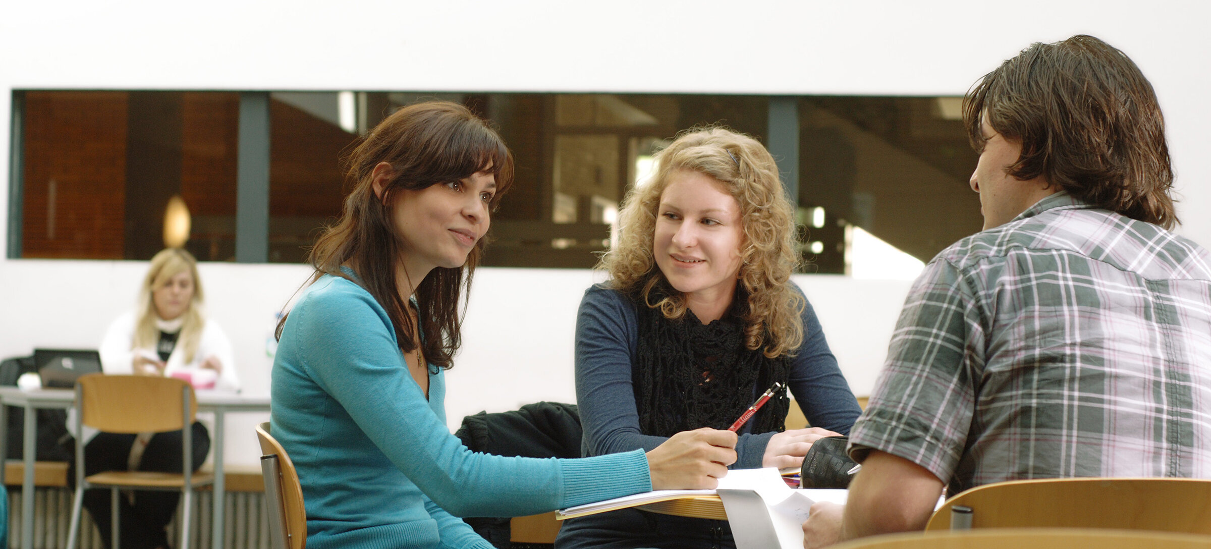 study group sitting in the Atrium of K building and learning together