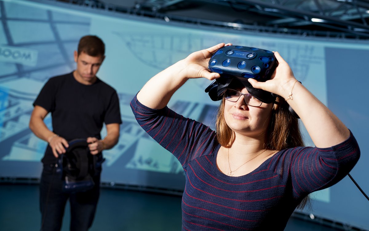 two students with VR goggles