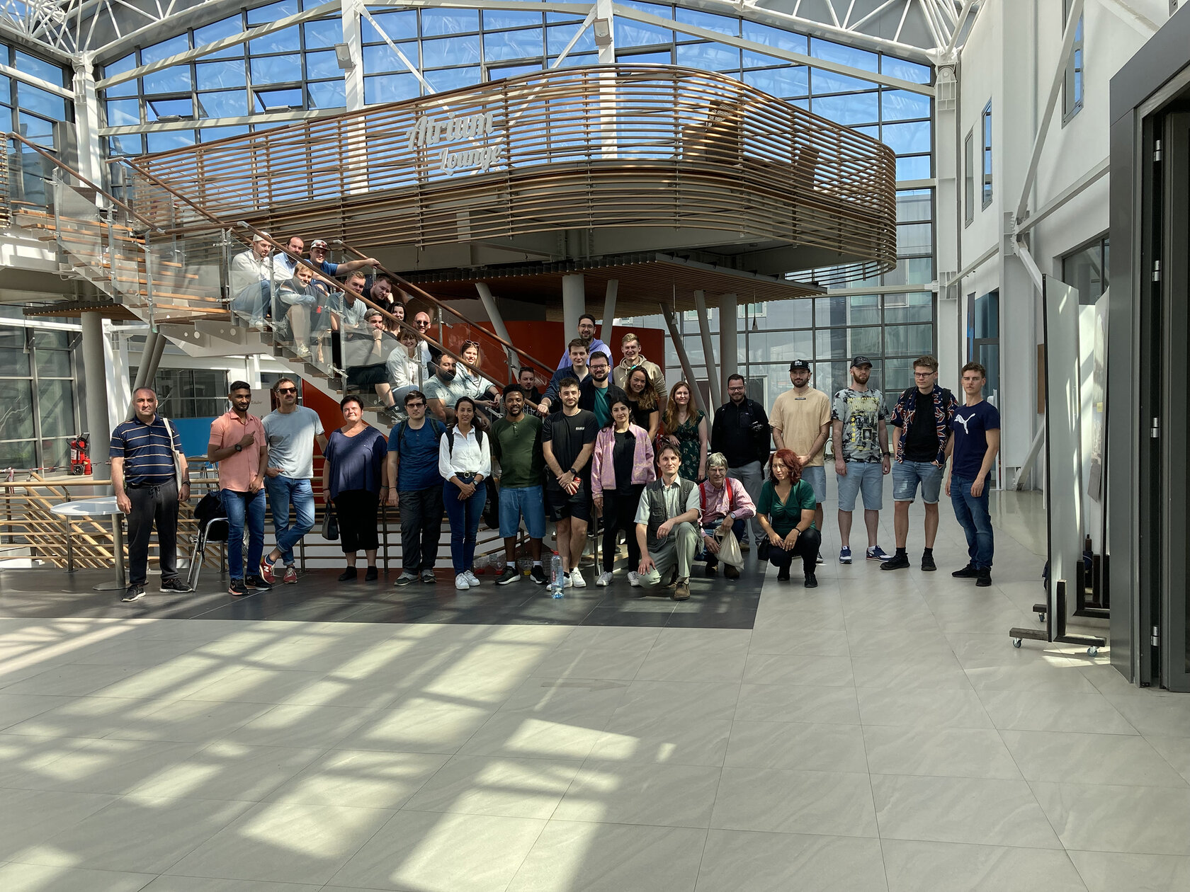 participants arranged on staircase