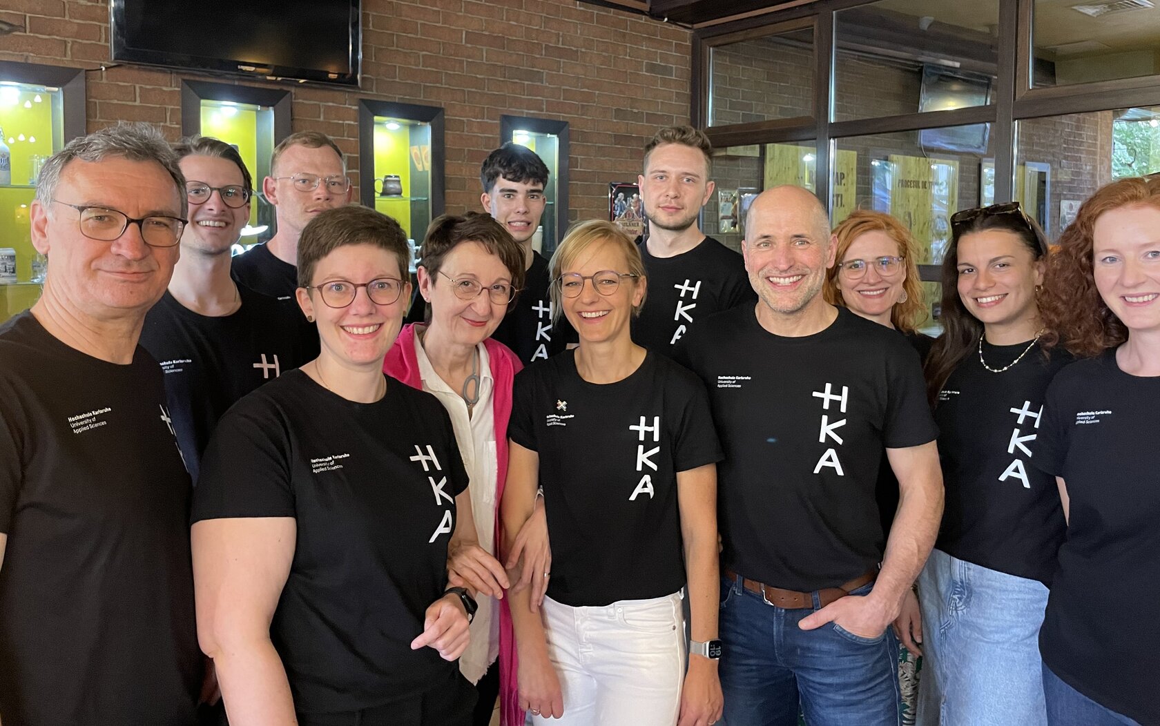 HKA group smiling at the camera