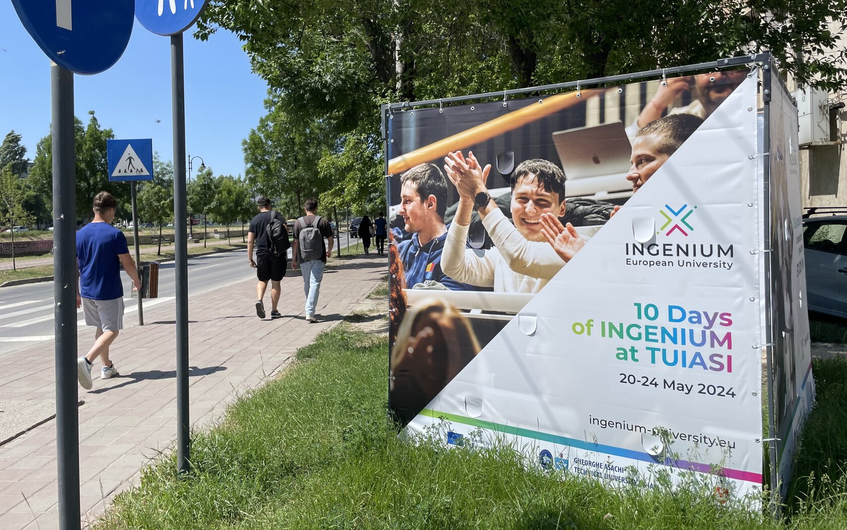 by means of a big board, the event is advertised in the city