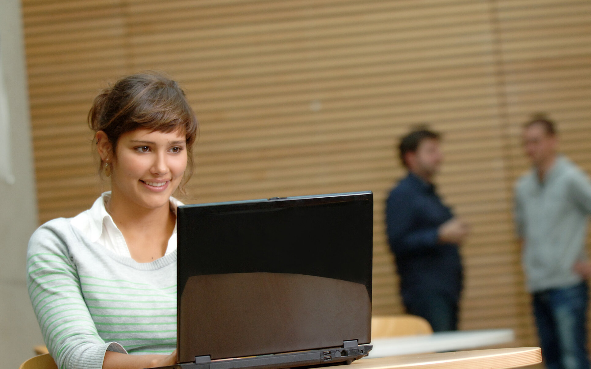 student working at laptop