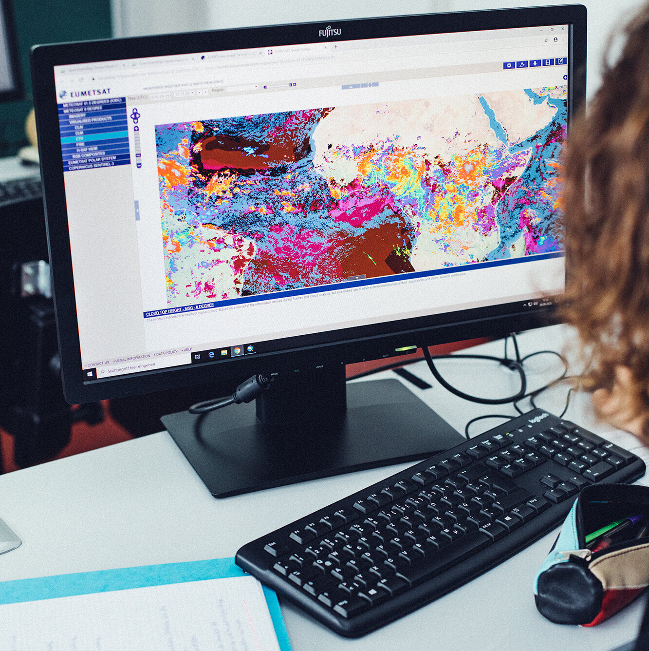 computer screen with colourful map on it
