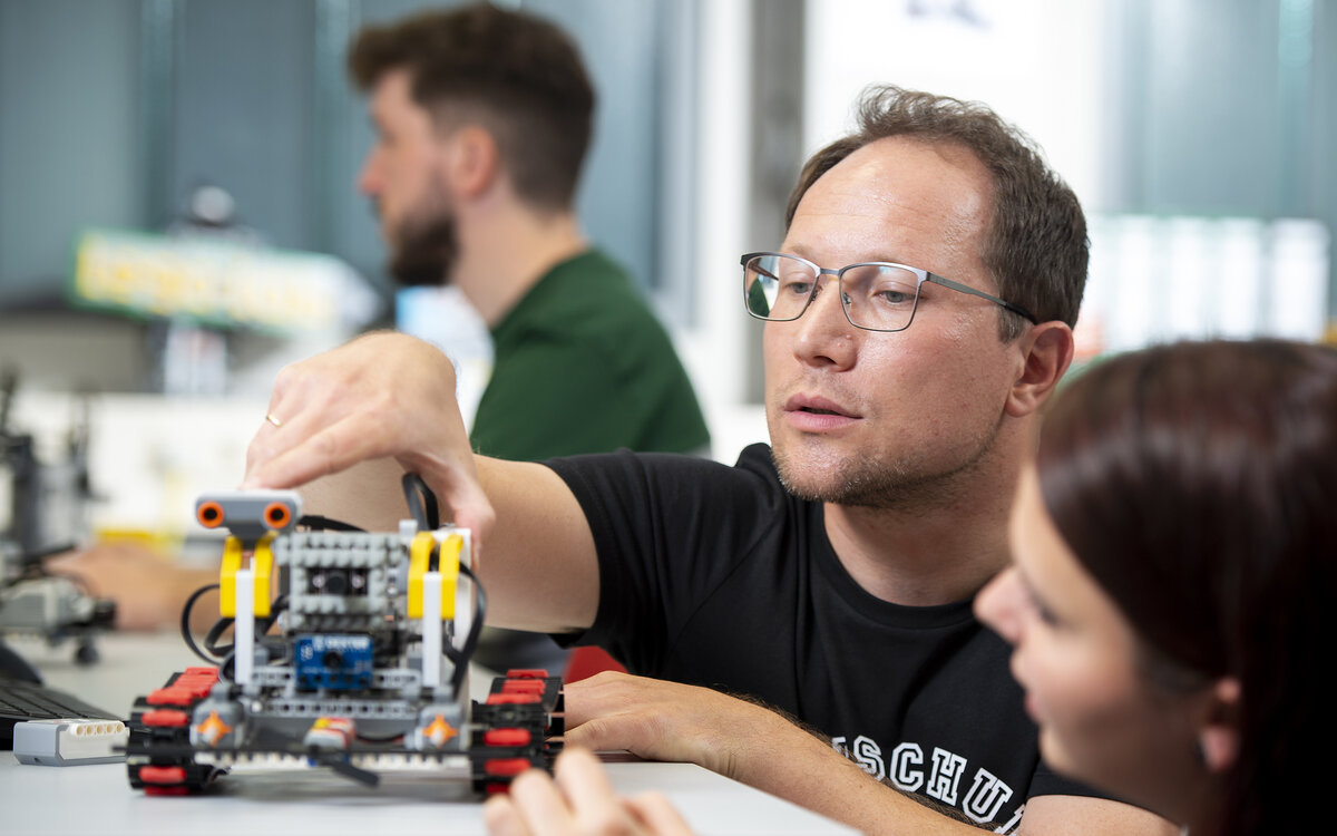 students building a small rover