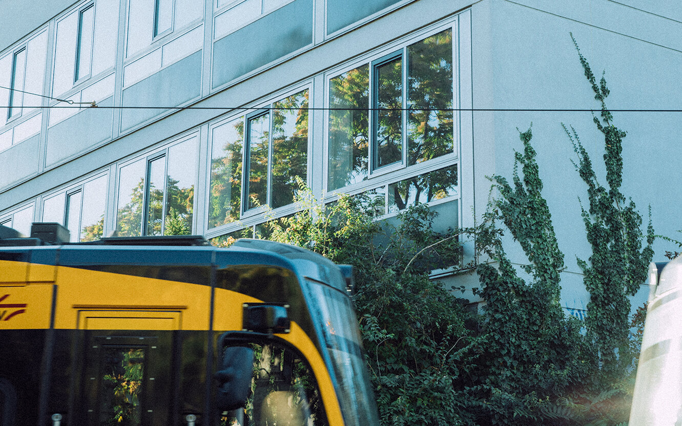 tram passing by the HKA building at Hoffstrasse