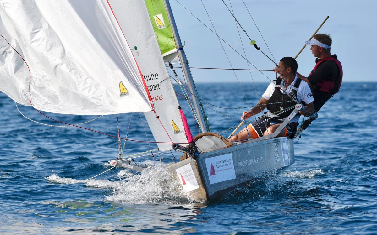 two students sailing their boat