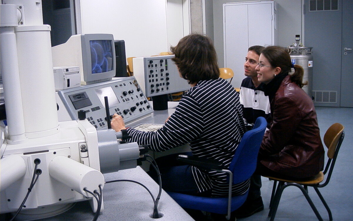 Group of students sitting at a control stand