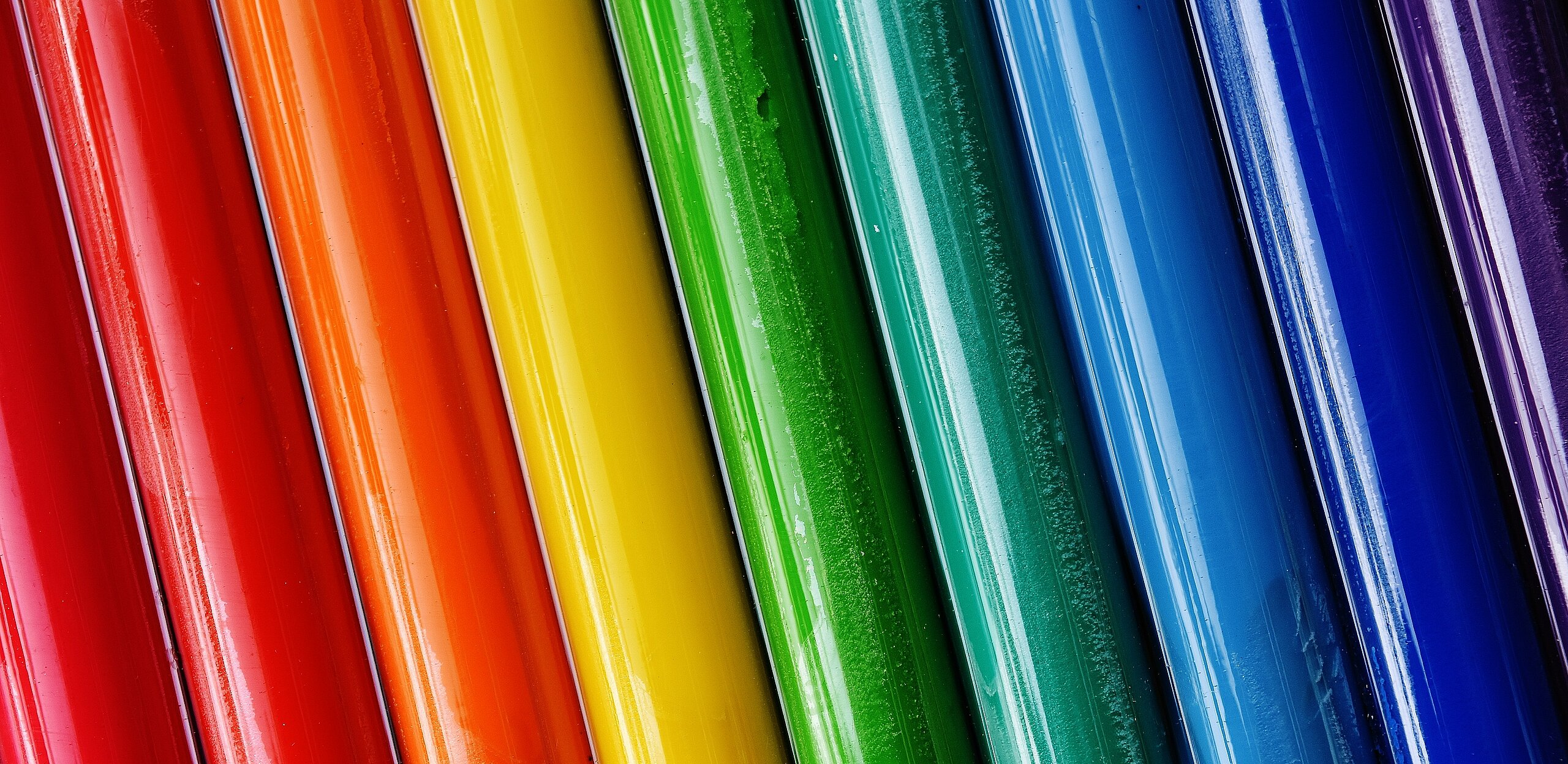 Differently coloured plastic tubes