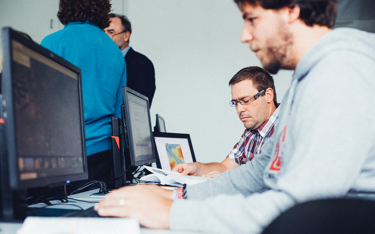 people working at computers