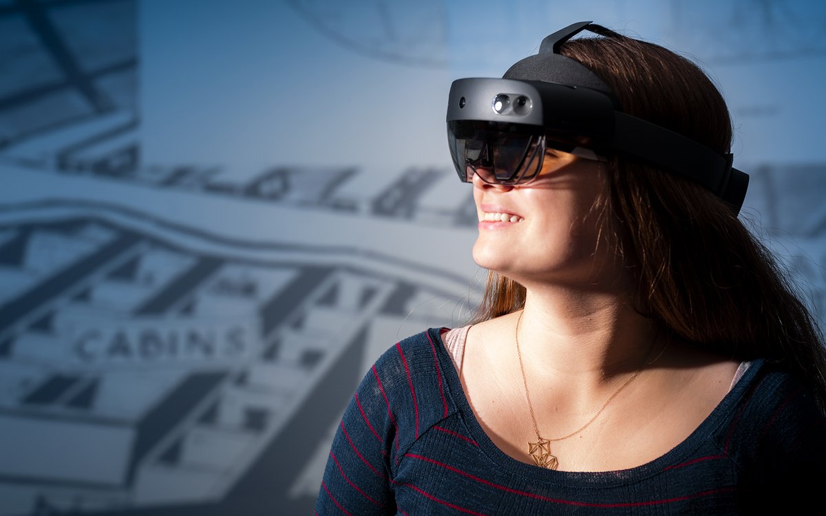 young woman wearing VR goggles