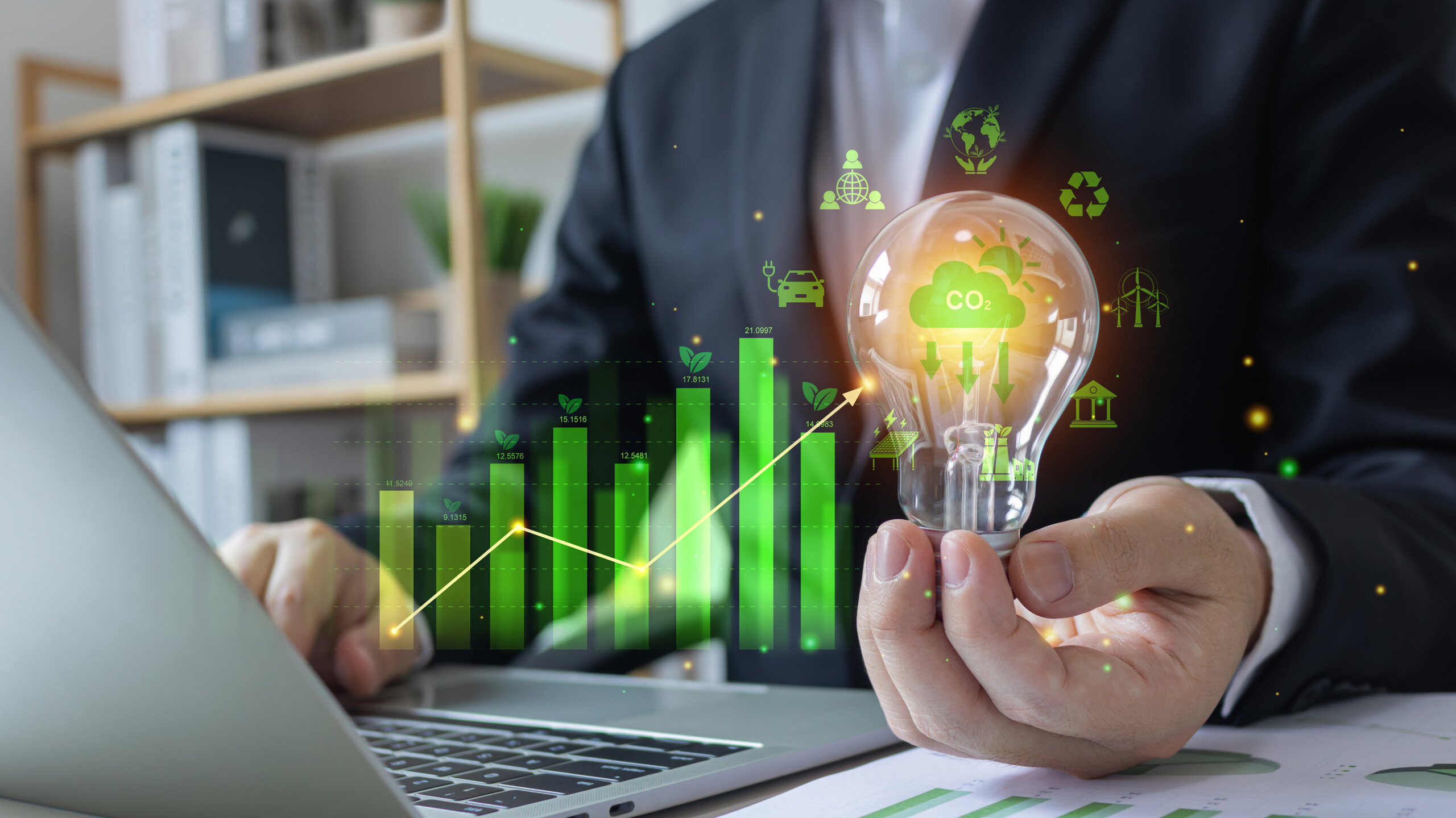 Reduce CO2, sustainability and Net zero carbon neutral.ESG environmental and Innovation through inspiration ideas concept.Person hand holding light bulb for starting new to investment environment.