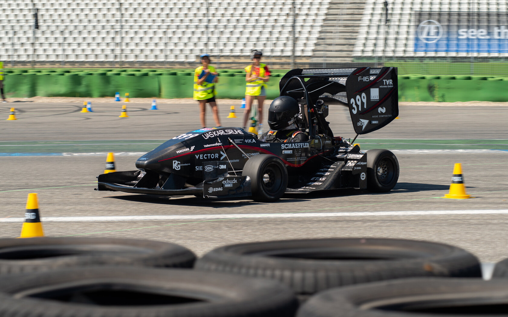 student in racecar F-116